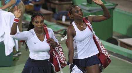 Tennis: Williams sisters crash out of doubles