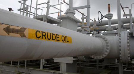 Oil prices fall on U.S. crude inventory build