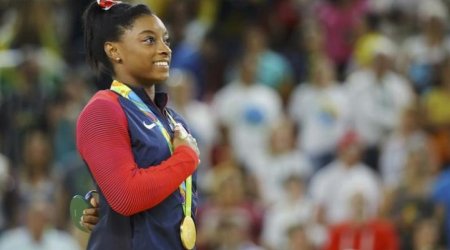 Biles wins women's vault gold