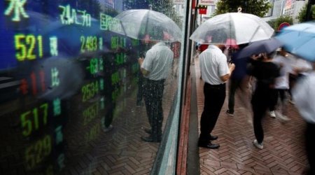 Asian stocks lifted by firmer oil prices; dollar steady