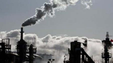 Oil prices edge up on expected U.S. crude inventory draw