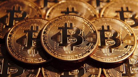 Bitkoinin dəyəri 10 000 dollara yaxınlaşır