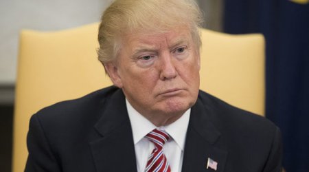 Tramp miqrantlara görə məhkəməyə verildi