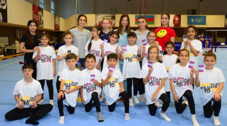 World champion gymnast meets children with disabilities in Baku (PHOTO)