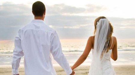 Rusiya vətəndaşı ilə evlənənlərə şad xəbər - Putin qanunu imzaladı