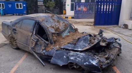 Bakıda sürüşmə zamanı torpağın altında qalan maşın çıxarıldı - Bu vəziyyətdədir - VİDEO