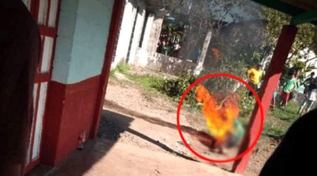 Qız uşağına təcavüz edib öldürən kişinin üstünə benzin töküb yandırdılar - FOTOLAR