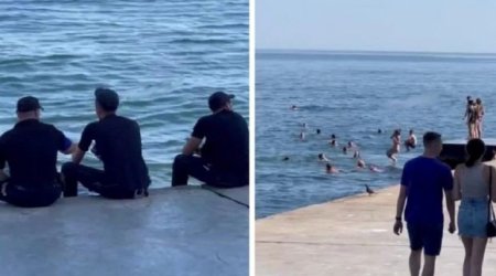 Ukraynada insanlar minalanmış dənizdə çimirlər - VİDEO