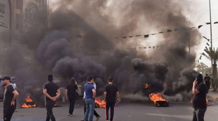 İraqda etirazlar BAŞLADI - Komendat saatı tətbiq olunur