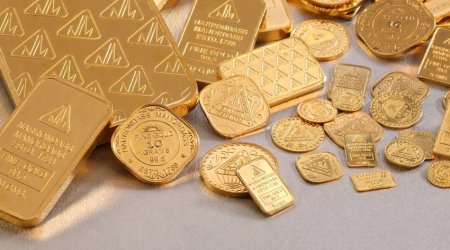 Gold prices hit $1,700 per troy ounce