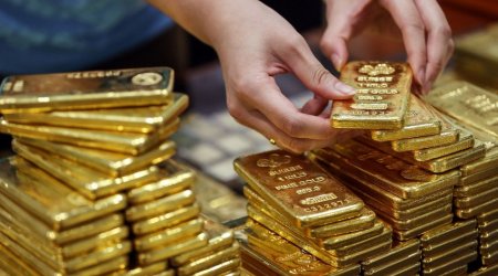 Gold price drops to $1,675 per troy ounce