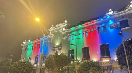 Municipal building in Peru illuminated with colors of Azerbaijani flag