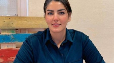 İranın daha bir idmançısı xarici ölkəyə sığınıb