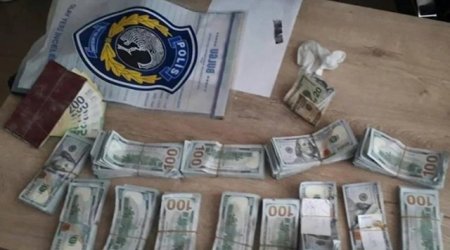 Rusiyalı xilasedicilər dağıntılar altından 150 min dollar tapdı