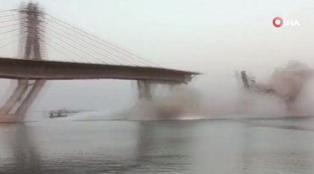 Bu ölkədə açılışa hazırlanan körpü uçdu- VİDEO