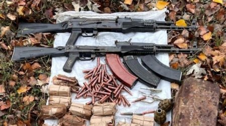 Assault rifle, machine gun, and grenades found in Khankandi