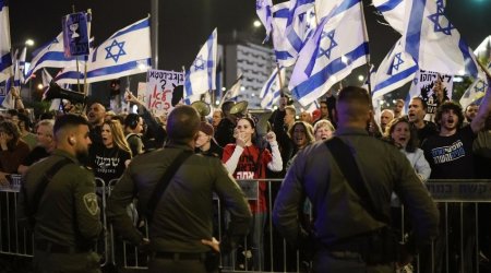 Protests in Israel over defense minister's resignation rumors