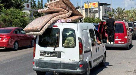 Livanda insanlar evlərini tərk edir - Fotolar