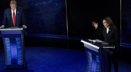 Harris holds slim lead over Trump in latest poll