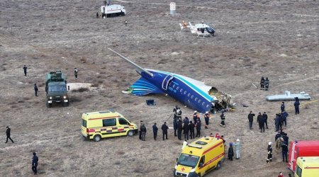 Plane crash survivor recounts stewardess's courage in the face of disaster