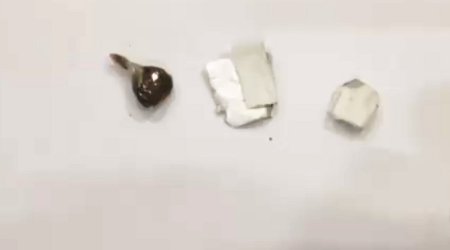 Ana həbsdəki oğluna narkotik keçirmək istəyib