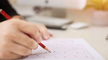 DİM-də imtahan qaydalarını pozan şəbəkə ifşa olunub