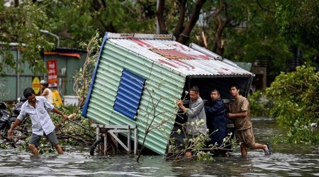 Vietnam floods leave at least 14 dead or missing