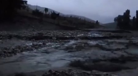 Heavy rain in Guba triggers floods, damages bridge