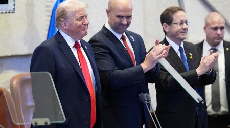 Israeli lawmaker interrupts Trump speech in Knesset