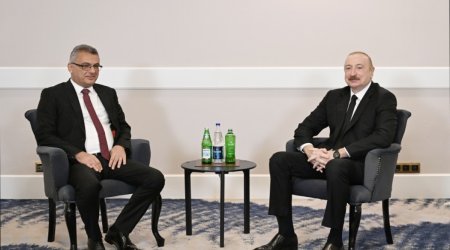 
İlham Əliyevin Antalyada Şimali Kipr Prezidenti ilə görüşü olub