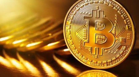 Bitcoin rises to $77,093 as Ethereum slips
