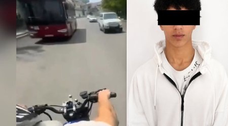 Polis motosikleti təhlükəli idarə edən sürücünü saxlayıb