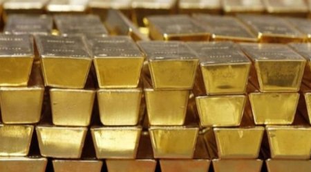 Gold rises, silver falls on COMEX