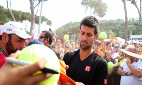 Djokovic makes winning return as Federer leaves home for Rome