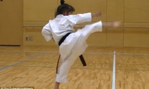 Fearsome seven-year-old girl shows off her black belt moves - VIDEO