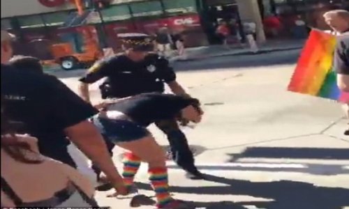 Cop investigated after being caught on camera 'grabbing a woman - PHOTO+VIDEO