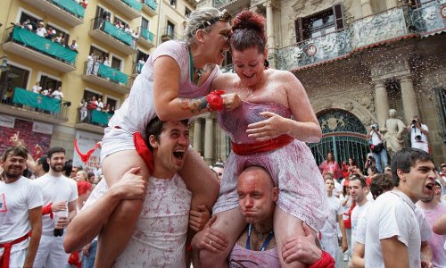 Thousands of revellers kick off iconic Spanish bull running festival - PHOTO