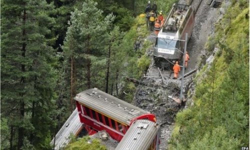 Swiss train derailed in landslide - VIDEO