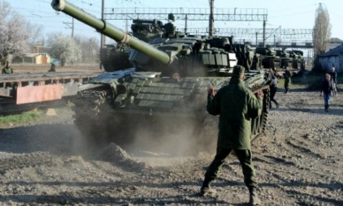 Ukraine crisis: T-72 tank shoots hole in Russian denial