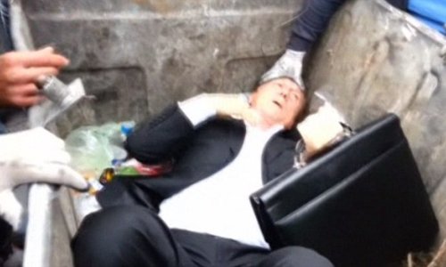 Former minister in Viktor Yanukovich's parliament is thrown in a rubbish bin - PHOTO+VIDEO