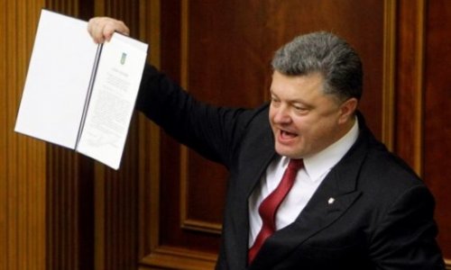 Ukraine ratifies EU deal, offers special status to rebels
