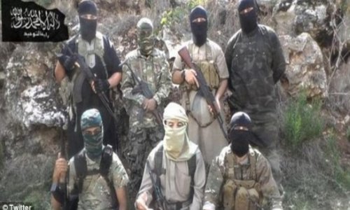 Seven British jihadis photographed in terror picture holding AK47