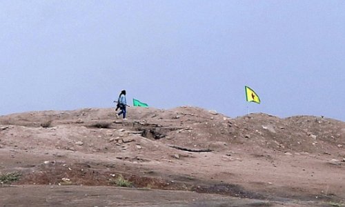 Kurds regain Kobane hill from Isil