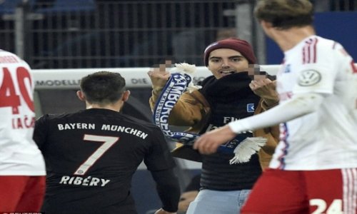 Ribery hit in the face with pitch invader's scarf