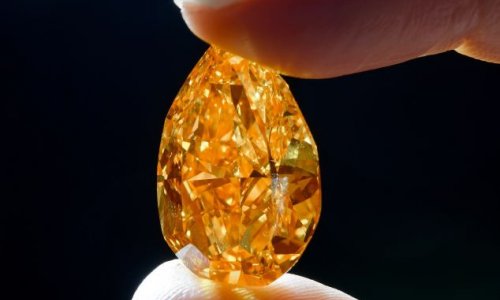 Rare orange diamond sold at auction for £22million - PHOTO