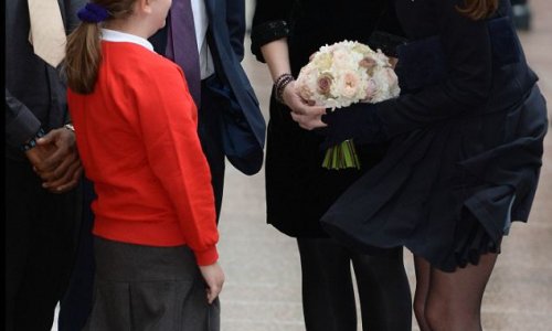 Kate has a Marilyn moment during charity visit - PHOTO