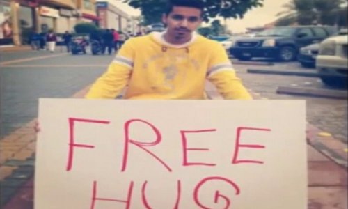 Religious police arrest man for free hugs