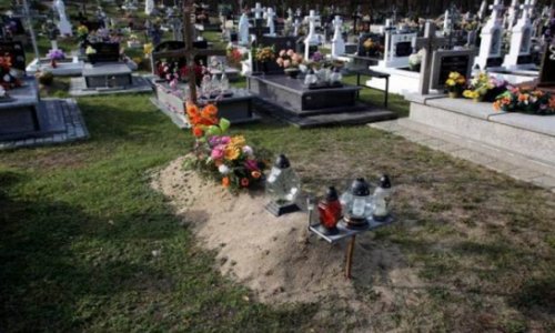 Man returns home to find parents laying flowers at his grave