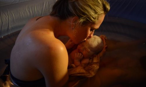 Body-builder mother gives birth to healthy baby boy - PHOTO