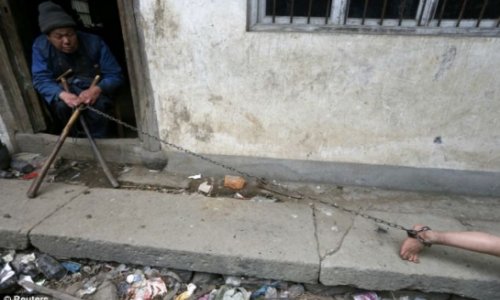 Young boy with mental illness is chained up by his relatives - PHOTO